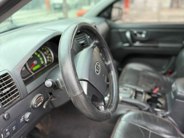 Черный Киа Соренто, объемом двигателя 2.4 л и пробегом 261 тыс. км за 6900 $, фото 14 на Automoto.ua