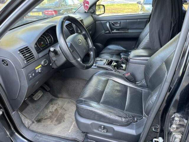 Чорний Кіа Соренто, об'ємом двигуна 2.5 л та пробігом 300 тис. км за 4800 $, фото 5 на Automoto.ua