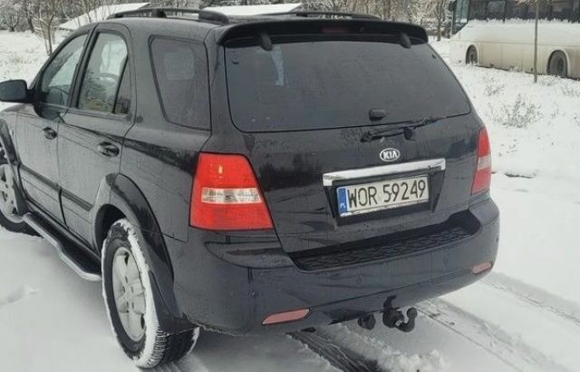Черный Киа Соренто, объемом двигателя 2.5 л и пробегом 217 тыс. км за 3400 $, фото 2 на Automoto.ua