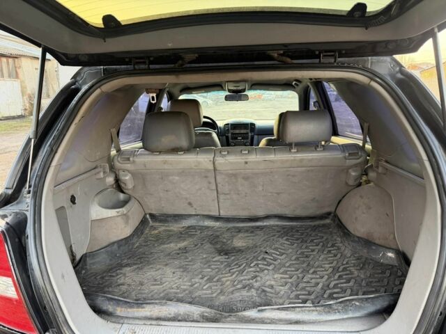 Черный Киа Соренто, объемом двигателя 2.5 л и пробегом 233 тыс. км за 4500 $, фото 8 на Automoto.ua