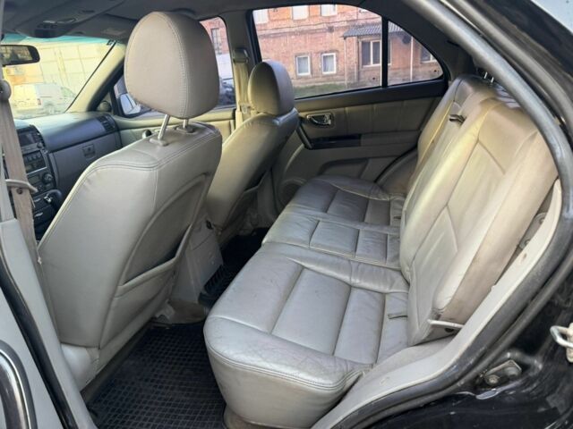 Черный Киа Соренто, объемом двигателя 2.5 л и пробегом 233 тыс. км за 4500 $, фото 7 на Automoto.ua