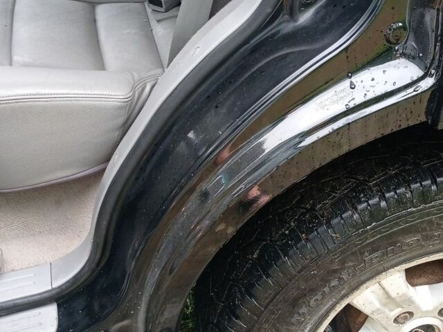 Черный Киа Соренто, объемом двигателя 2.5 л и пробегом 286 тыс. км за 6600 $, фото 5 на Automoto.ua