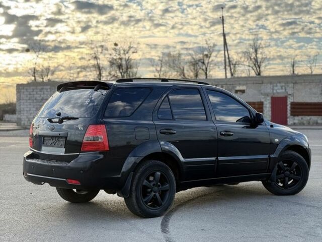 Черный Киа Соренто, объемом двигателя 2.5 л и пробегом 290 тыс. км за 5300 $, фото 2 на Automoto.ua