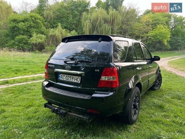 Черный Киа Соренто, объемом двигателя 2.5 л и пробегом 270 тыс. км за 5999 $, фото 12 на Automoto.ua