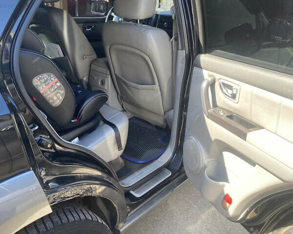 Чорний Кіа Соренто, об'ємом двигуна 2.5 л та пробігом 370 тис. км за 7000 $, фото 6 на Automoto.ua