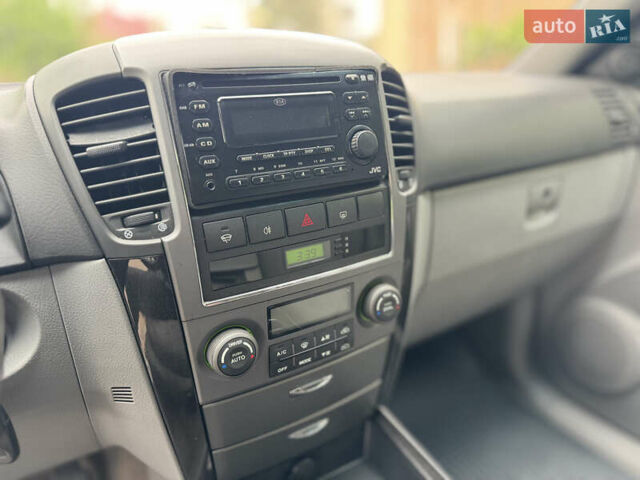 Черный Киа Соренто, объемом двигателя 2.5 л и пробегом 213 тыс. км за 7700 $, фото 9 на Automoto.ua