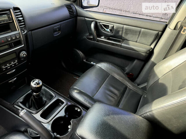 Черный Киа Соренто, объемом двигателя 2.5 л и пробегом 291 тыс. км за 9000 $, фото 17 на Automoto.ua