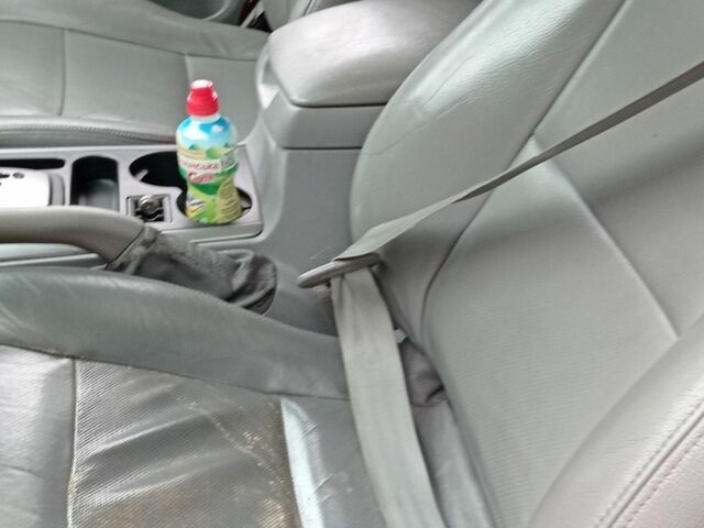 Черный Киа Соренто, объемом двигателя 2.5 л и пробегом 286 тыс. км за 6600 $, фото 12 на Automoto.ua