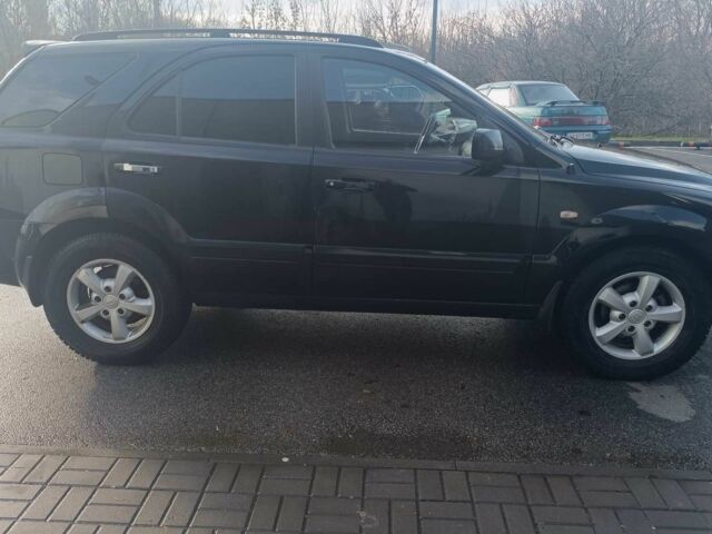 Черный Киа Соренто, объемом двигателя 2.5 л и пробегом 250 тыс. км за 3950 $, фото 4 на Automoto.ua