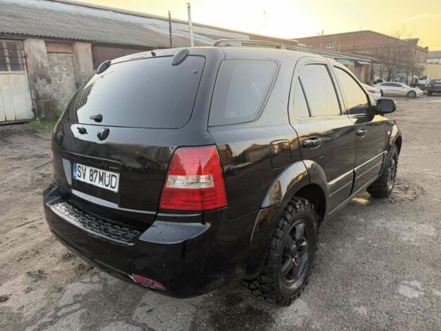 Черный Киа Соренто, объемом двигателя 2.5 л и пробегом 233 тыс. км за 4500 $, фото 1 на Automoto.ua