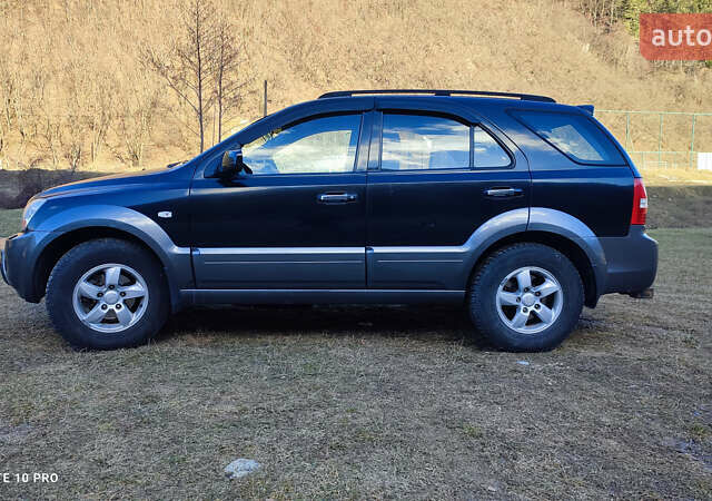 Черный Киа Соренто, объемом двигателя 2.5 л и пробегом 224 тыс. км за 7500 $, фото 1 на Automoto.ua