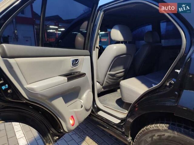 Черный Киа Соренто, объемом двигателя 2.5 л и пробегом 250 тыс. км за 9500 $, фото 18 на Automoto.ua