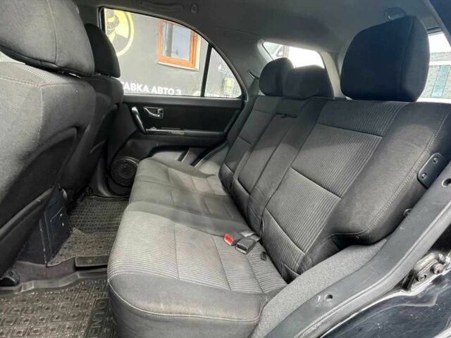 Черный Киа Соренто, объемом двигателя 2.5 л и пробегом 240 тыс. км за 8999 $, фото 21 на Automoto.ua