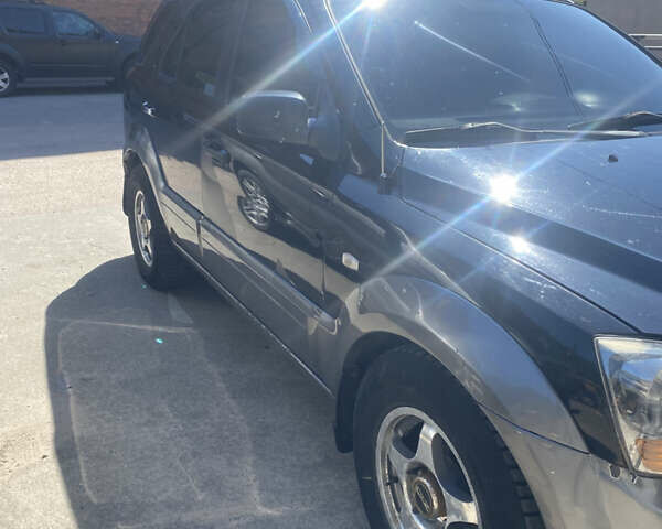 Чорний Кіа Соренто, об'ємом двигуна 2.5 л та пробігом 370 тис. км за 7000 $, фото 4 на Automoto.ua