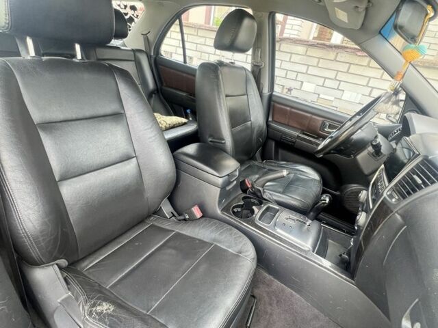 Черный Киа Соренто, объемом двигателя 2.5 л и пробегом 280 тыс. км за 4499 $, фото 11 на Automoto.ua