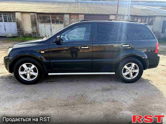 Черный Киа Соренто, объемом двигателя 2.5 л и пробегом 258 тыс. км за 4500 $, фото 1 на Automoto.ua