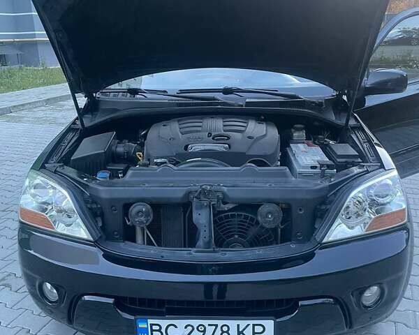 Черный Киа Соренто, объемом двигателя 2.5 л и пробегом 250 тыс. км за 8200 $, фото 27 на Automoto.ua