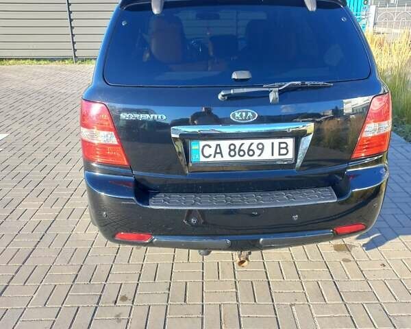 Чорний Кіа Соренто, об'ємом двигуна 2.5 л та пробігом 310 тис. км за 9000 $, фото 17 на Automoto.ua