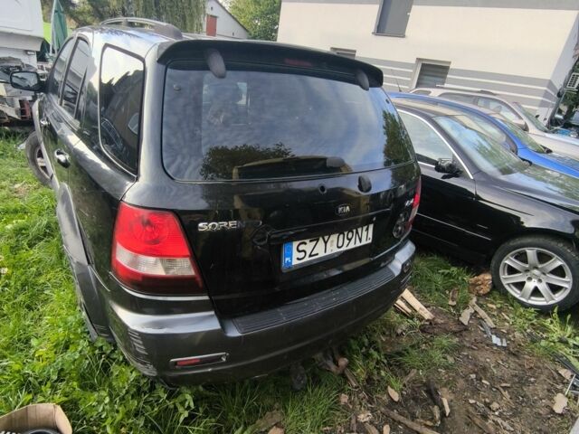 Черный Киа Соренто, объемом двигателя 2.5 л и пробегом 180 тыс. км за 1387 $, фото 23 на Automoto.ua