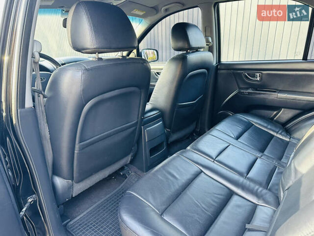 Черный Киа Соренто, объемом двигателя 2.5 л и пробегом 139 тыс. км за 8650 $, фото 23 на Automoto.ua