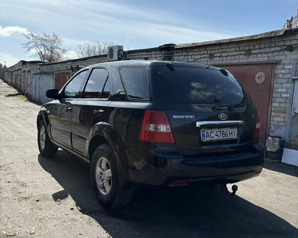 Чорний Кіа Соренто, об'ємом двигуна 2.5 л та пробігом 284 тис. км за 8000 $, фото 3 на Automoto.ua