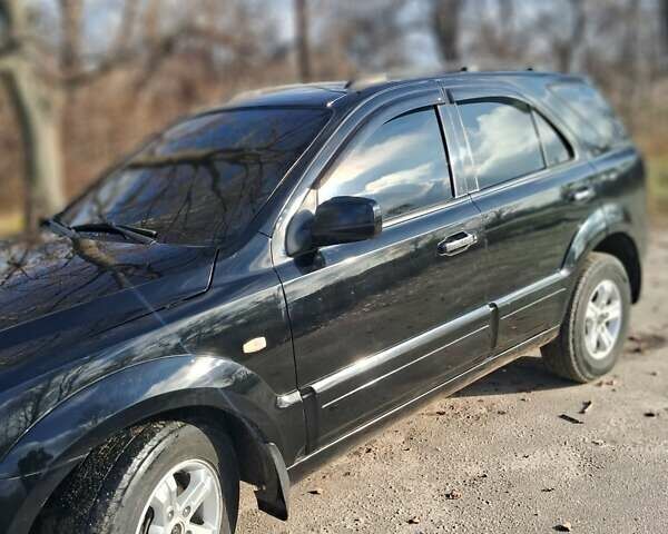 Черный Киа Соренто, объемом двигателя 2.5 л и пробегом 282 тыс. км за 8300 $, фото 8 на Automoto.ua