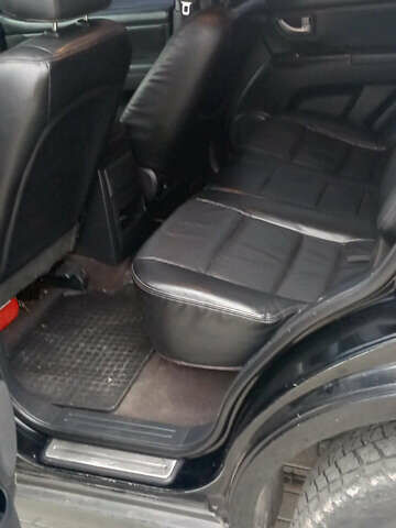 Черный Киа Соренто, объемом двигателя 2.5 л и пробегом 260 тыс. км за 7900 $, фото 3 на Automoto.ua