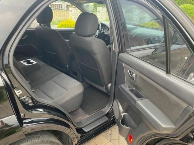 Черный Киа Соренто, объемом двигателя 2.5 л и пробегом 246 тыс. км за 3800 $, фото 10 на Automoto.ua