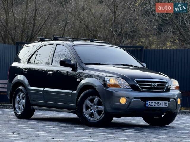 Черный Киа Соренто, объемом двигателя 2.5 л и пробегом 208 тыс. км за 8200 $, фото 1 на Automoto.ua