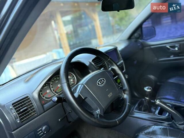 Черный Киа Соренто, объемом двигателя 2.5 л и пробегом 208 тыс. км за 8200 $, фото 50 на Automoto.ua