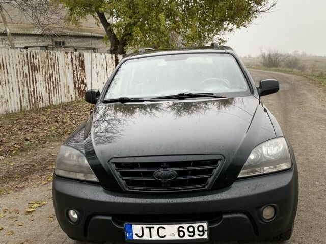 Чорний Кіа Соренто, об'ємом двигуна 2.5 л та пробігом 250 тис. км за 4100 $, фото 1 на Automoto.ua