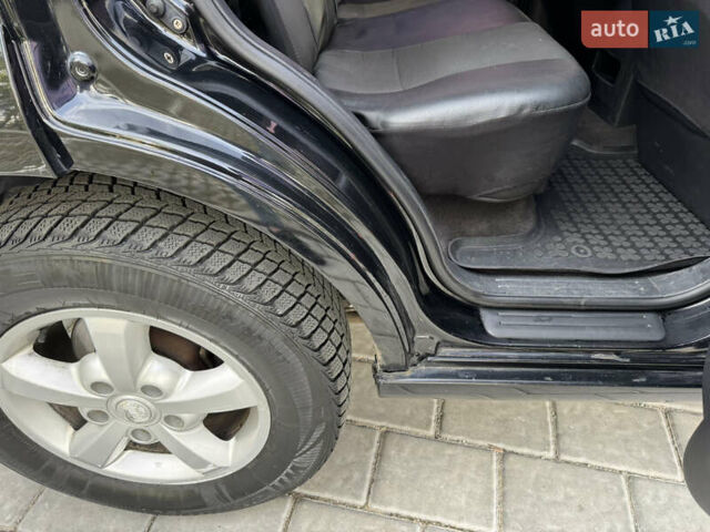 Черный Киа Соренто, объемом двигателя 2.5 л и пробегом 237 тыс. км за 5500 $, фото 9 на Automoto.ua