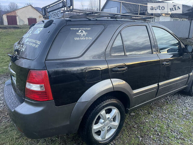 Черный Киа Соренто, объемом двигателя 2.5 л и пробегом 300 тыс. км за 8700 $, фото 6 на Automoto.ua