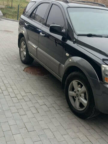 Черный Киа Соренто, объемом двигателя 2.5 л и пробегом 260 тыс. км за 7900 $, фото 5 на Automoto.ua