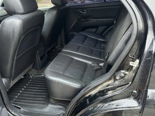 Чорний Кіа Соренто, об'ємом двигуна 2.5 л та пробігом 244 тис. км за 2601 $, фото 9 на Automoto.ua