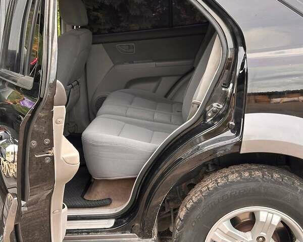 Чорний Кіа Соренто, об'ємом двигуна 2.5 л та пробігом 256 тис. км за 8500 $, фото 28 на Automoto.ua
