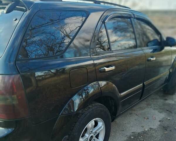 Черный Киа Соренто, объемом двигателя 2.5 л и пробегом 282 тыс. км за 8300 $, фото 1 на Automoto.ua