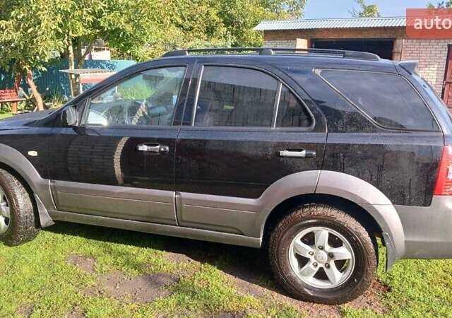 Черный Киа Соренто, объемом двигателя 2.5 л и пробегом 186 тыс. км за 8000 $, фото 1 на Automoto.ua