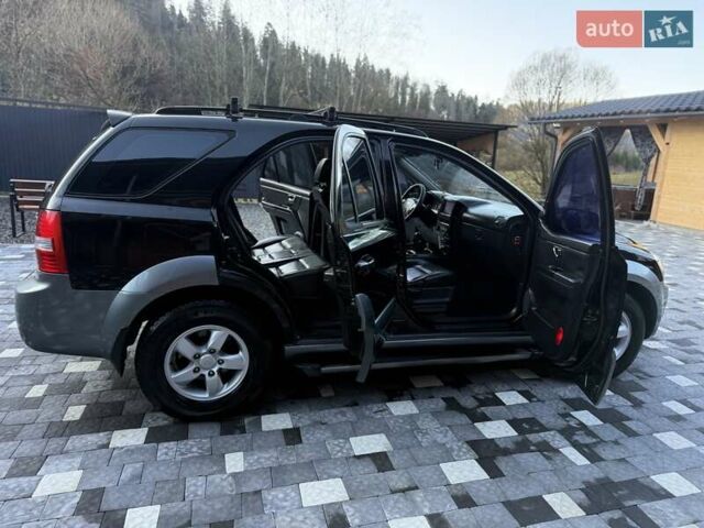 Черный Киа Соренто, объемом двигателя 2.5 л и пробегом 208 тыс. км за 8200 $, фото 87 на Automoto.ua