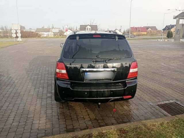 Черный Киа Соренто, объемом двигателя 2.5 л и пробегом 250 тыс. км за 4870 $, фото 10 на Automoto.ua