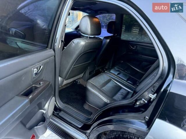 Черный Киа Соренто, объемом двигателя 2.5 л и пробегом 208 тыс. км за 8200 $, фото 44 на Automoto.ua