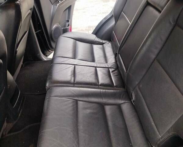 Черный Киа Соренто, объемом двигателя 2.5 л и пробегом 213 тыс. км за 8500 $, фото 10 на Automoto.ua