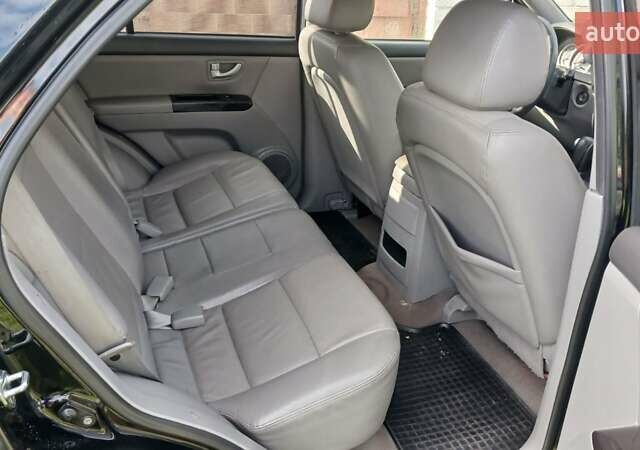 Черный Киа Соренто, объемом двигателя 2.5 л и пробегом 186 тыс. км за 8000 $, фото 7 на Automoto.ua