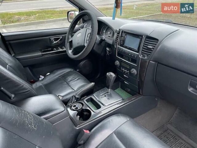 Черный Киа Соренто, объемом двигателя 2.5 л и пробегом 203 тыс. км за 8700 $, фото 22 на Automoto.ua
