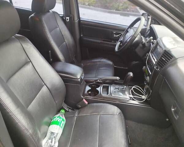 Черный Киа Соренто, объемом двигателя 2.5 л и пробегом 213 тыс. км за 8500 $, фото 11 на Automoto.ua