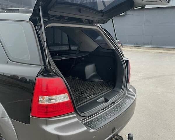 Черный Киа Соренто, объемом двигателя 2.5 л и пробегом 203 тыс. км за 8700 $, фото 18 на Automoto.ua