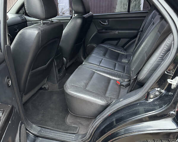 Чорний Кіа Соренто, об'ємом двигуна 3.3 л та пробігом 211 тис. км за 5750 $, фото 10 на Automoto.ua