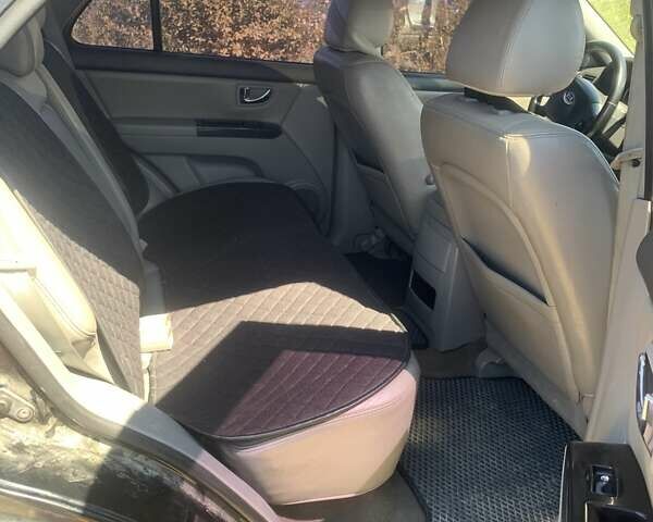 Черный Киа Соренто, объемом двигателя 2.5 л и пробегом 300 тыс. км за 7300 $, фото 6 на Automoto.ua