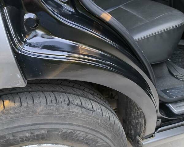 Чорний Кіа Соренто, об'ємом двигуна 2.5 л та пробігом 99 тис. км за 8900 $, фото 11 на Automoto.ua