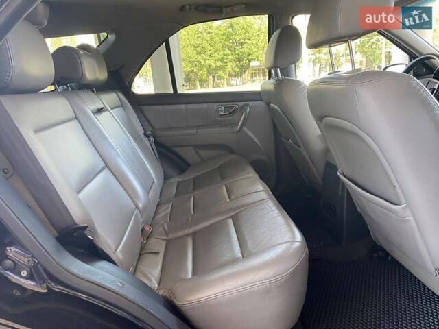 Черный Киа Соренто, объемом двигателя 2.5 л и пробегом 259 тыс. км за 9999 $, фото 18 на Automoto.ua
